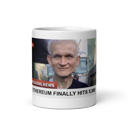 A humorous mug design from Troll Social Club featuring a mock news broadcast with the headline "Ethereum Finally Hits 5,000" and an artistic depiction of an aged Vitalik Buterin, playfully mocking the slow market performance of Ethereum by suggesting it took so long to reach this milestone that Vitalik has grown old.